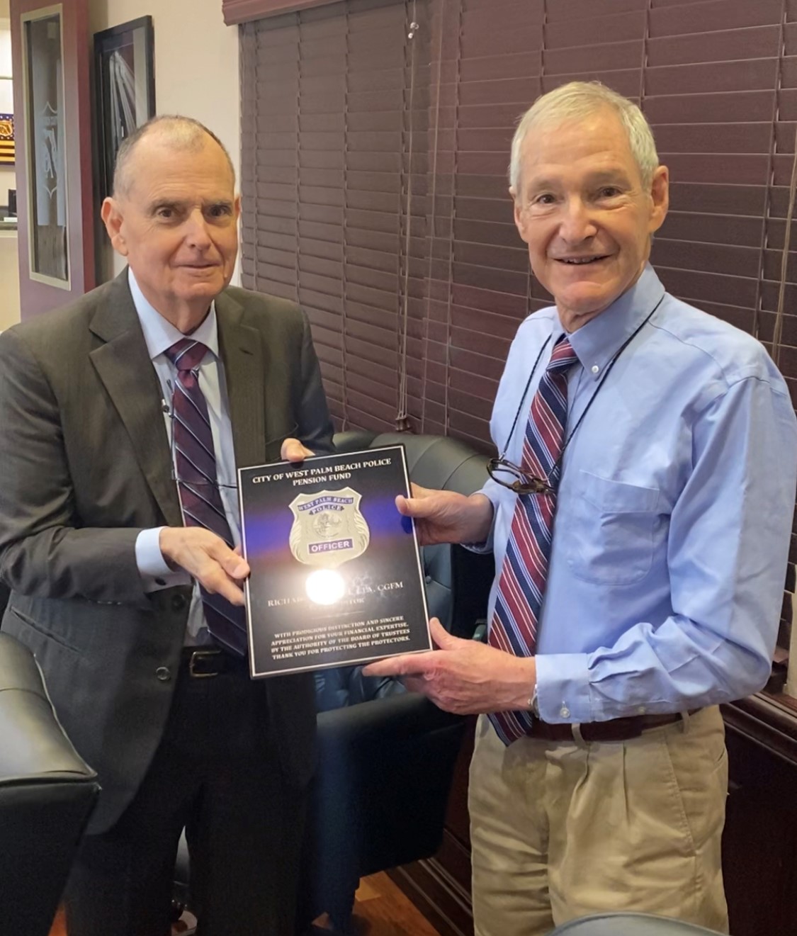 August 13, 2021: On behalf of the Board of Trustees, Chairman Jack Frost (R) presented Mr. Richard Cristini (L) with a token of appreciation for his professional services rendered during the Plan Audits.