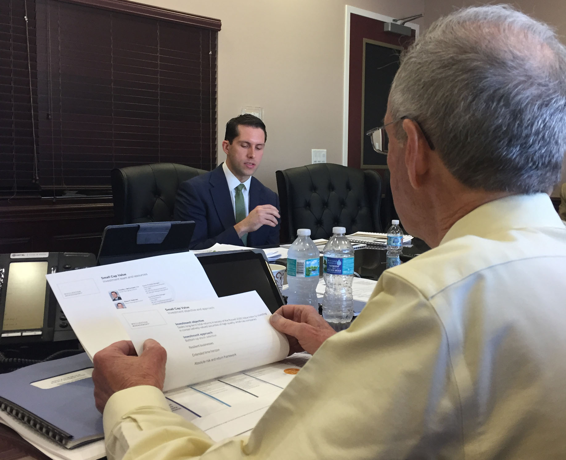 Chairman Jack Frost listens intently to James DiGiuseppe, CAIA from Wellington Management, who handles the Fund's small cap value portfolio.